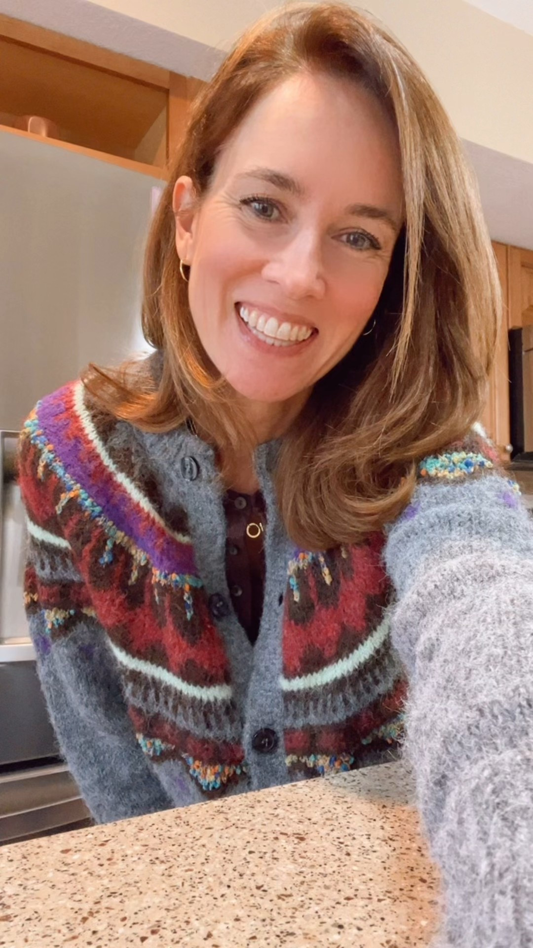 Holiday baking - in the kitchen about to make my famous  Christmas biscotti wearing my favorite Urban Outfitters fair isle cardigan with my American Eagle brown Henley and old navy tank layered underneath with my Citizens of Humanity jeans. Gold Gorjana necklace and Bauble Bar gold hoops. Getting ready for the winter storm and staying cozy inside. #myootd 

#LTKdayinmylife #LTKOver40 #LTKvlog