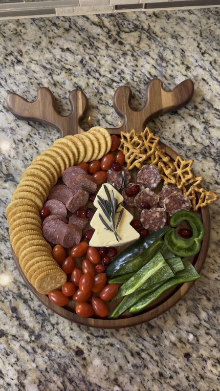 Holiday hosting season 🦌🎄  Holiday parties are such a great way to bring people together, enjoy delicious food, exchange gifts, and create lasting memories. It’s my favorite time of the year! This reindeer cheese board or serving plate is perfect for Christmas Day appetizers or as a gift. The little snack tray is also fun for dips, veggies, olives or any small size holiday party food. And, these unscented Christmas tree candles are so cute as a festive statement piece! 🎄🎄
#holidaypartyfood 



#LTKVideo #LTKparties #LTKHoliday