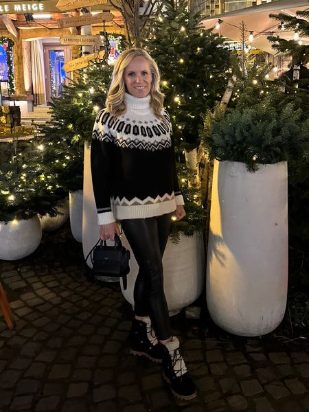 Dinner in Megève in the French Alps 

Cozy black and white Gair aisle Sweater from Tuckernuck 
Commando black faux leather leggings are the most real looking you can find! Soft and comfortable but hold you in. 
Joan of Artoc Black suede wedge boots 
All fits TTS 


#LTKstyletip #LTKtravel #LTKSeasonal