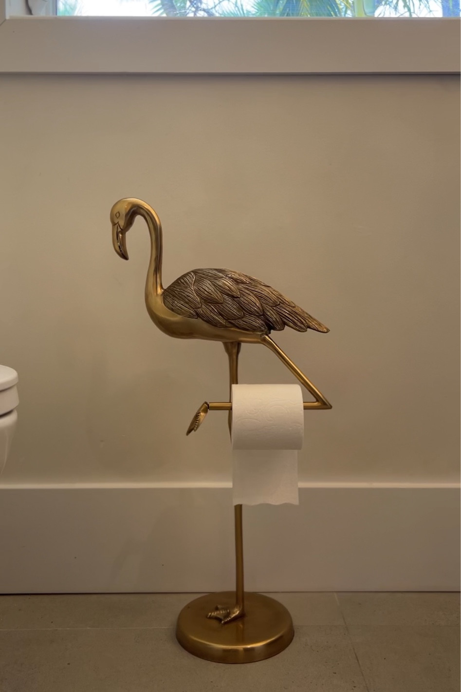 Flamingo toilet paper holder. Really heavy and good quality!!! 

#LTKHome