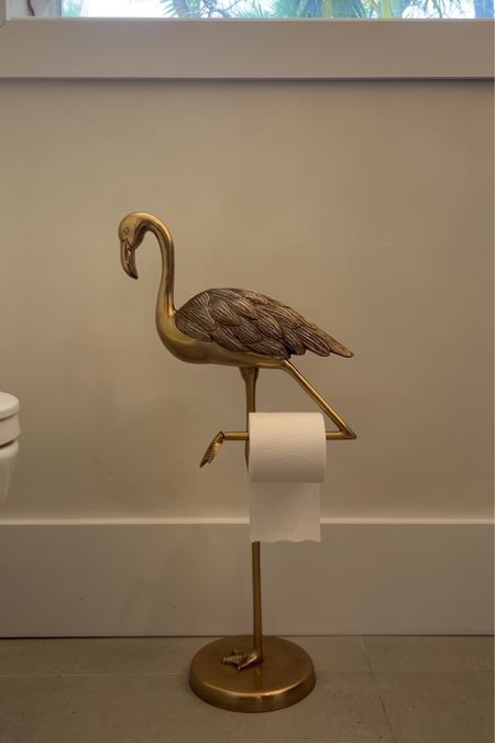 Flamingo toilet paper holder. Really heavy and good quality!!! 

#LTKHome