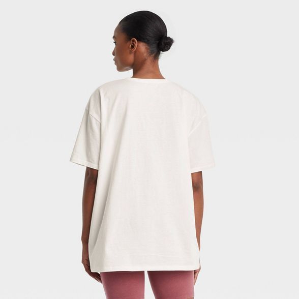 Women's Zodiac Floral Chart Short Sleeve Oversized Graphic T-Shirt - White | Target