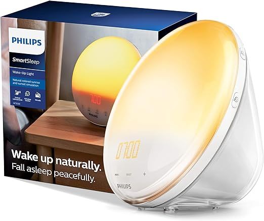 Philips SmartSleep Wake-up Light, Colored Sunrise and Sunset Simulation, 5 Natural Sounds, FM Rad... | Amazon (US)