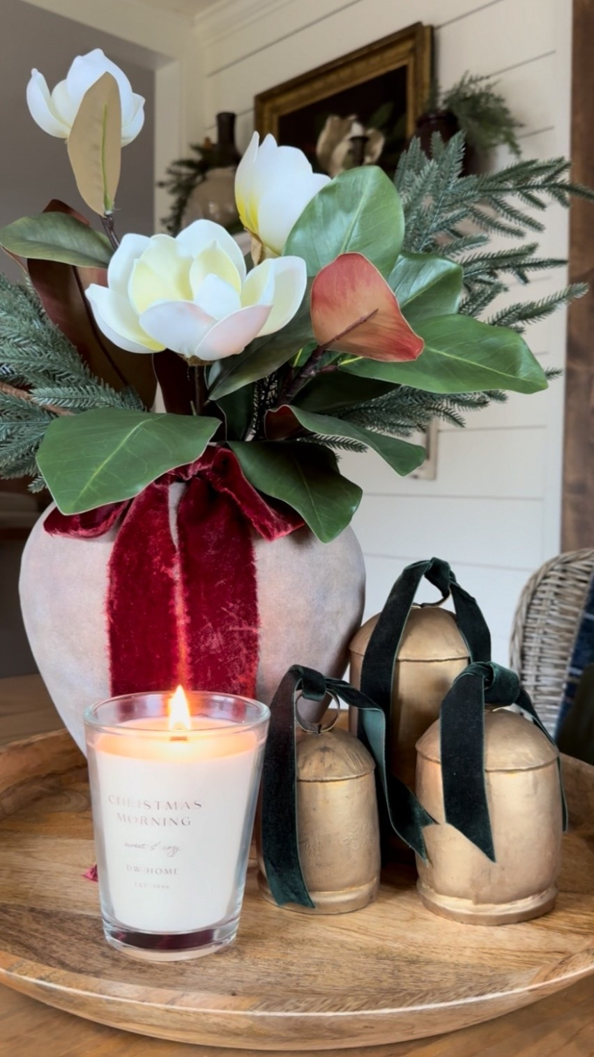 ✨ How to Build a Christmas Centerpiece That Feels Collected, Old-World, and Effortlessly Designer ✨
If you’re craving a Christmas centerpiece that looks high-end without the stress, here’s my favorite formula—easy, flexible, and absolutely stunning every time. Start with any tray as your base, then anchor the look with a piece of old-world inspired designer pottery—the kind with a beautiful aged patina that brings instant character and charm.
Next, build your foundation using greenery stems. Faux or fresh works—just make sure it spills naturally over the rim to create that lush, timeless Christmas feel. From here, you have options:
• Add red or white berries for a classic holiday pop
• Use magnolia stems for an elegant Southern touch
• Or tuck in red roses for a romantic, moody Christmas moment
Sometimes I love to finish the vase with a simple bow for extra charm. Then, decorate the tray with a few accent pieces—candles, bells with bows, marble trees, a deer statue, or anything beautiful you already have at home.
Here’s the design rule that makes it foolproof:
⭐️ Use odd numbers.
The vase + arrangement counts as one item. A cluster of three bells counts as another. A single candle in front could be your third. Our eyes are naturally drawn to groups of three, and that’s why this layout always feels balanced and intentional.
This simple method works for any Christmas centerpiece—mix and match pieces you love, play with scale and texture, and let your personality show. That’s what turns decor into something magical. ✨🎄
#ChristmasCenterpiece #HolidayDecorIdeas #OldWorldChristmas #DesignerHolidayDecor #ChristmasStylingTips #HomeDecorInspo