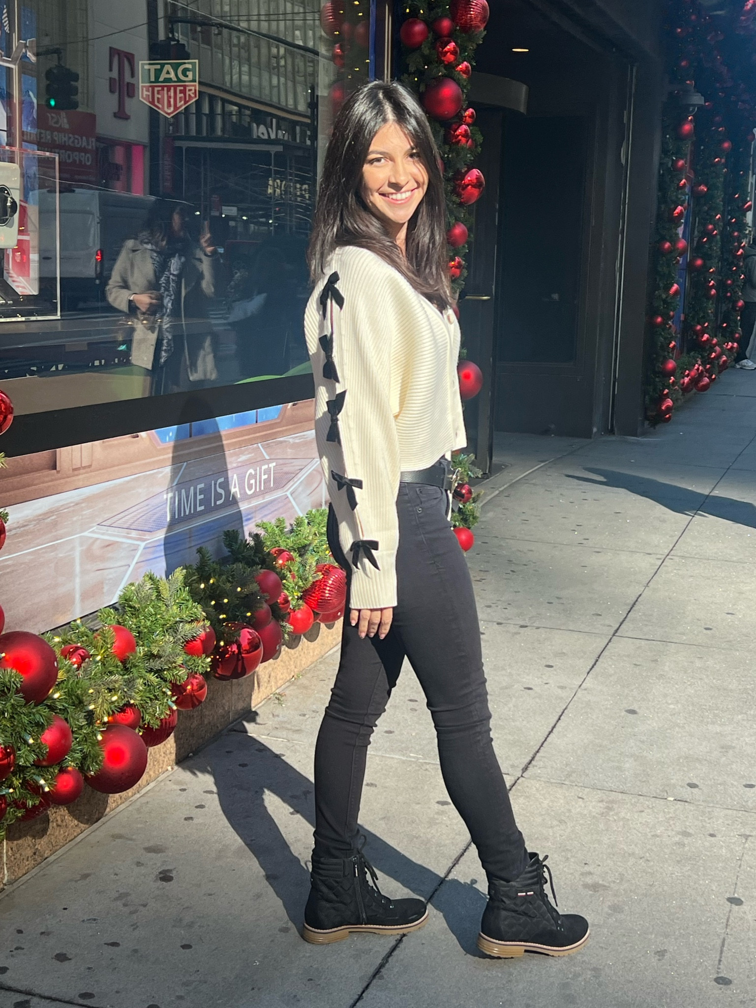 Wearing this adorable bow sweater. 

#LTKFindsUnder100 #LTKHoliday #LTKStyleTip