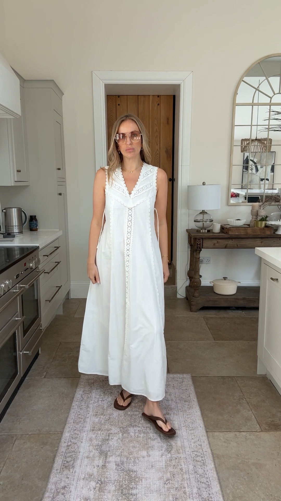 Such a lovely dress for the price point 
The detail is 👌🏻 
A great simple cut that fits around the bust /torso and gently flares 
Tie detail at sides which can be worn with a bra tube top (the uniqlo one is excellent) , no bra or same colour bra . 
I’m wearing a U.K. 14 
Available in black too. 

Summer dress
White dress 

#LTKsummer #LTKtravel #LTKdresses