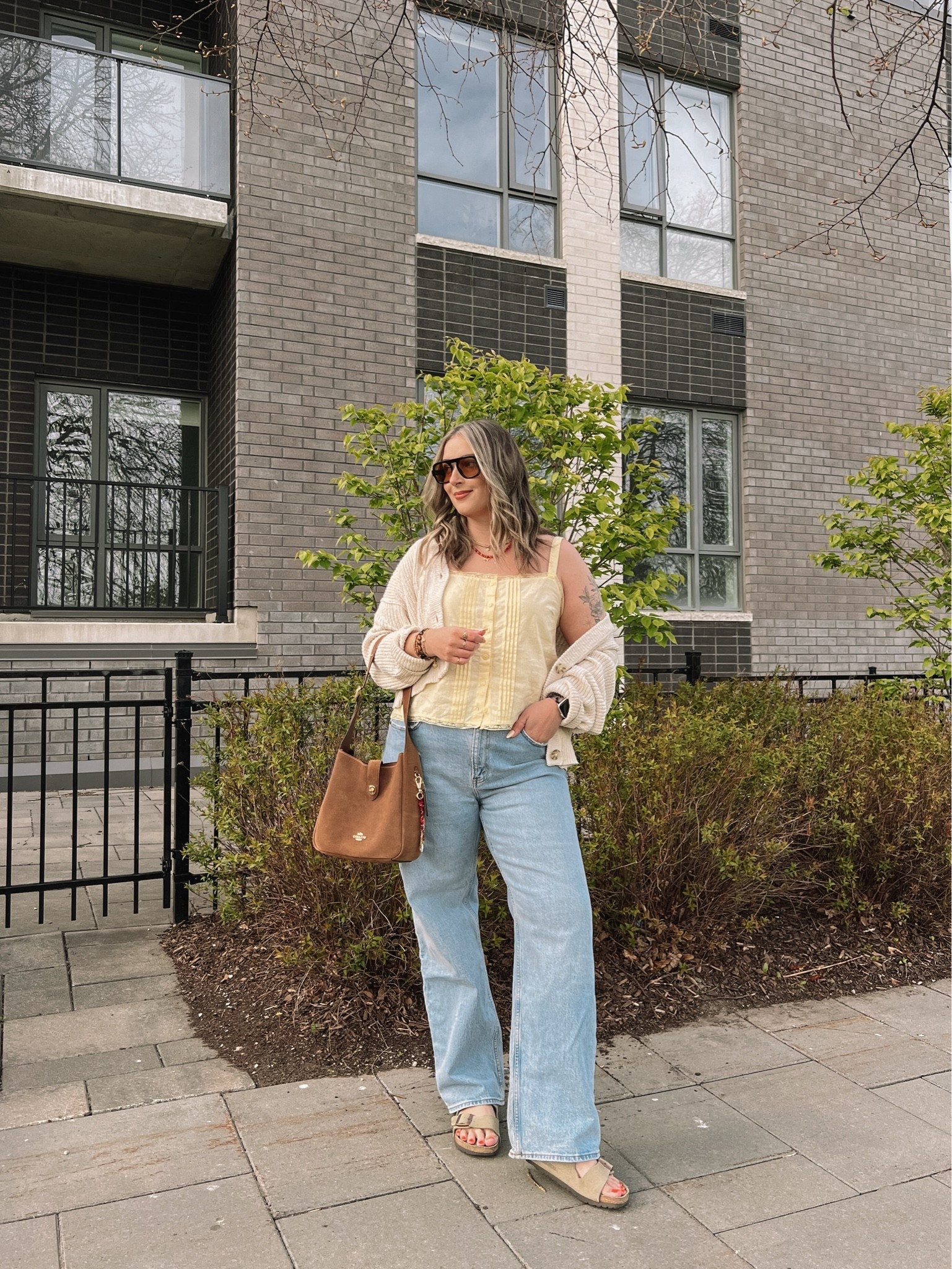 Casual spring outfit! Wearing my usual L in the butter yellow tank top (Canadian link under “similar products”). Wearing 32 in my Abercrombie jeans for a looser fit. Cardigan is old but I linked an almost identical one! Birkenstock sandals fit TTS

#LTKsale #LTKjeans #LTKmidsize