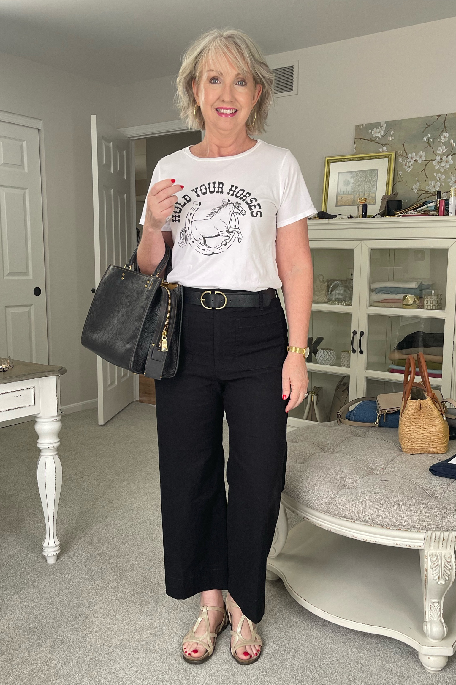 Summer casual OOTD. Shop these lightweight comfy separates from Anthropologie for 20% off today (07/09/23) TODAY ONLY. Be sure to copy the code as you enter their website through my links. The pants are TTS and come in other colors, too. And how cute is that tee??? TTS  

#LTKFind #LTKsalealert #LTKxAnthro