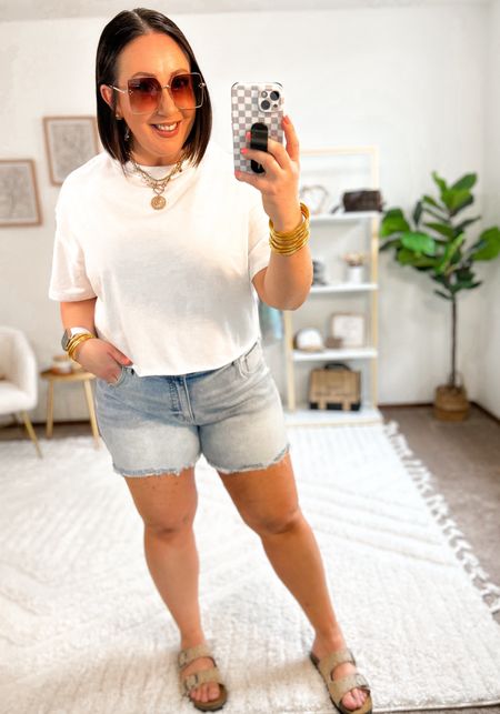 New Time and Tru destructed denim shorts. These run really small. I had to size up 2 sizes to a size 18 in order for these to fit me. They will feel tight around the inner thighs. I think if you’re less curvy, you could give these a try. They’re so cute and I really wanted to make these work!

Elbow sleeve cropped tee from Target is a fun one for those of you who love the cropped fit. Size xl in mine. Sandals run tts. 

#LTKmidsize #LTKSeasonal #LTKfindsunder50