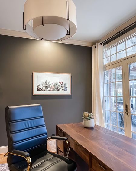 Moody, modern home office with Frame TV, black leather chair, mid century modern desk 

#LTKFind #LTKfamily #LTKhome