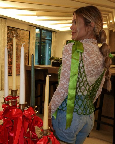 Grinch themed party | green holiday outfit | holiday outfit inspo | beaded top with bow straps | mesh long sleeve | lace longsleeve 

#LTKstyletip #LTKfindsunder50 #LTKHoliday