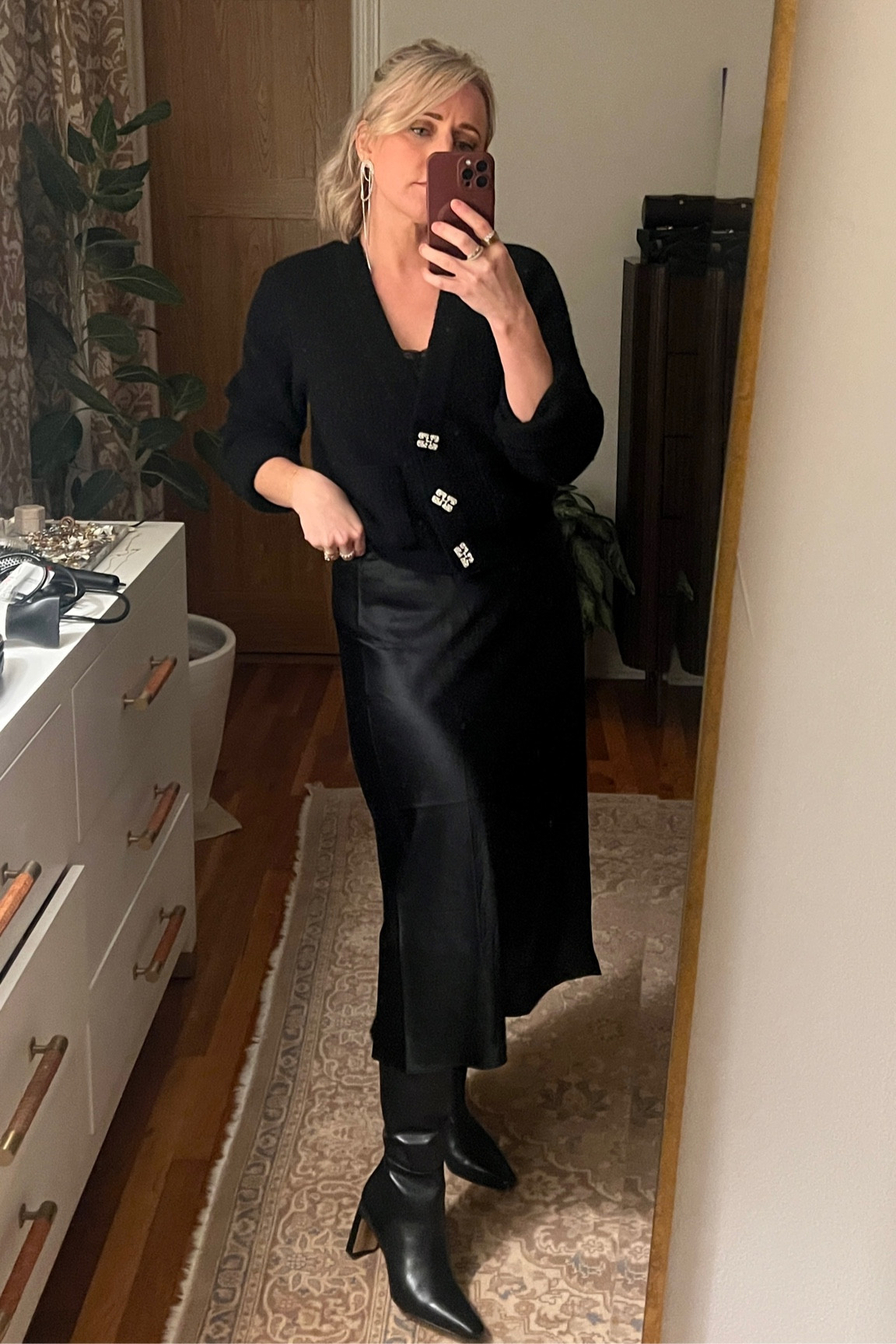 Black silk skirt, black cashmere cardigan, black knee high boots, rhinestone earrings

#LTKFindsUnder50 #LTKSaleAlert #LTKSeasonal