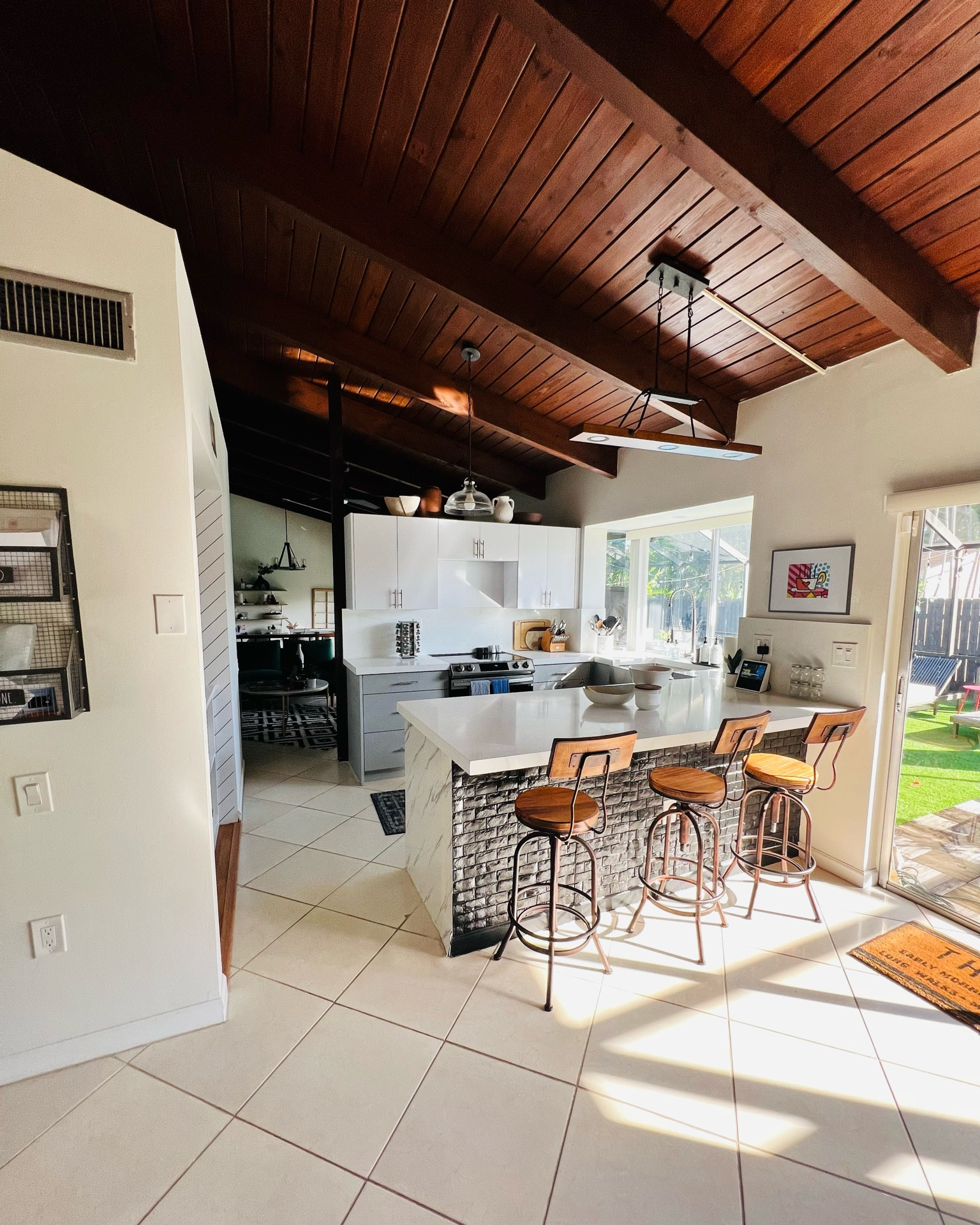 People hate peninsula kitchens but I really love ours! 
Home decor
Stools
Black tile

#LTKhome #LTKFind