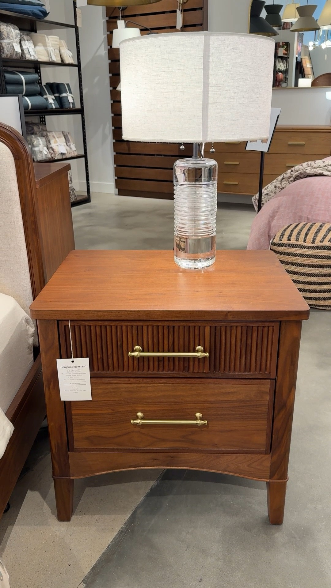 Rich luxe nightstand moment! ✨ The Islington Nightstand from Rejuvenation is such a gorgeous bedroom piece with its elegant fluted detailing, warm wood finish, and elevated silhouette. 🤎 The whole design feels timeless, refined, and beautifully high-end. 
A stunning bedside table for a luxe designer-inspired bedroom. Linked this nightstand and similar styles! 💫 #Nightstand #BedroomFurniture #BedsideTable

#LTKHome #LTKSaleAlert