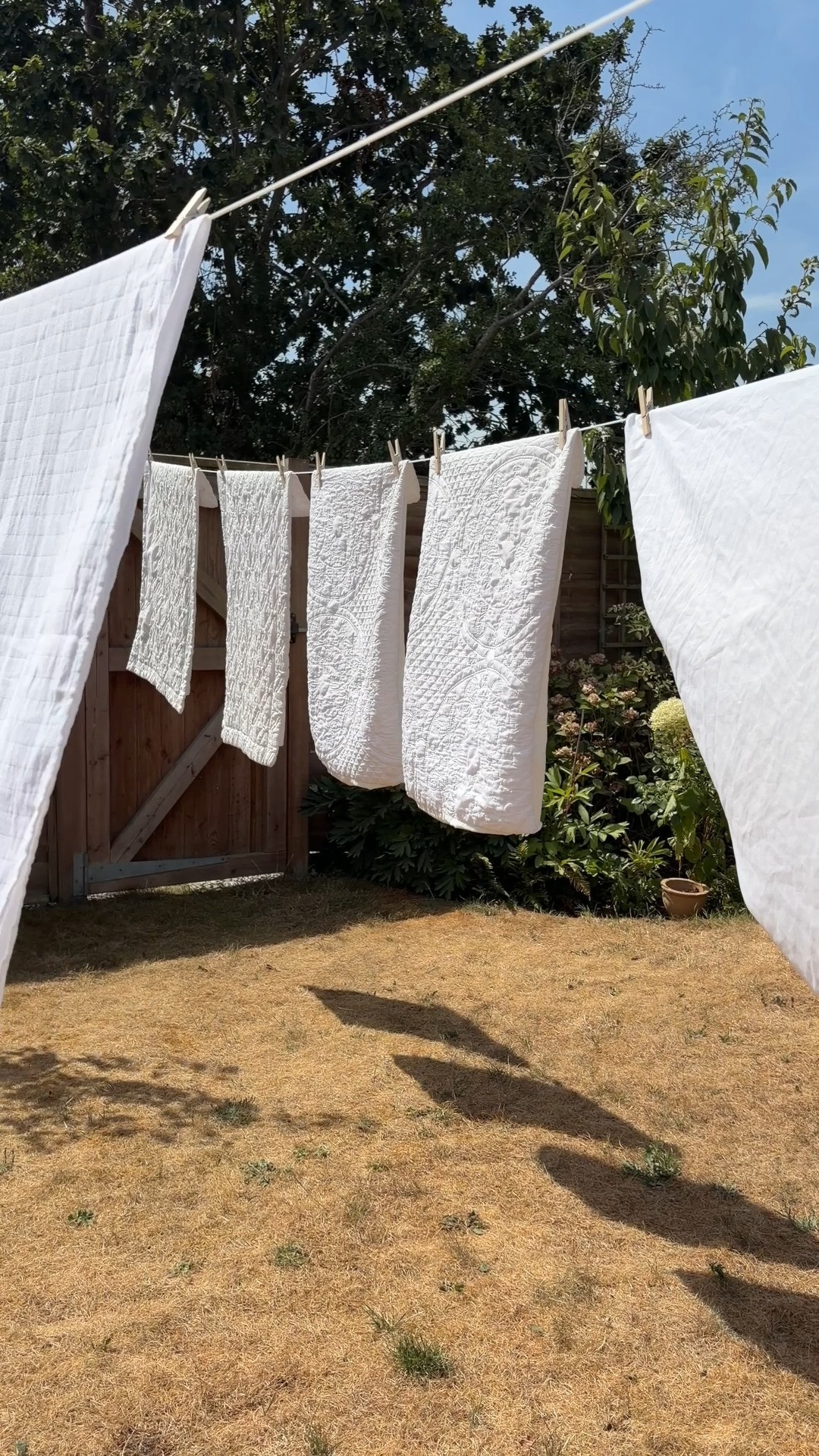 This is your sign to romanticise summer  laundry days 🤍🧺 This Minky Retractable Clothes Line has a double extendable line, giving you plenty of space to hang everything out to dry then it neatly retracts away when you’re done. Paired with classic wooden pegs, it’s practical, simple, and somehow makes the garden feel like a scene from a Nancy Meyers film 🤍 

 #LTKuk #LTKsummer #LTKhome