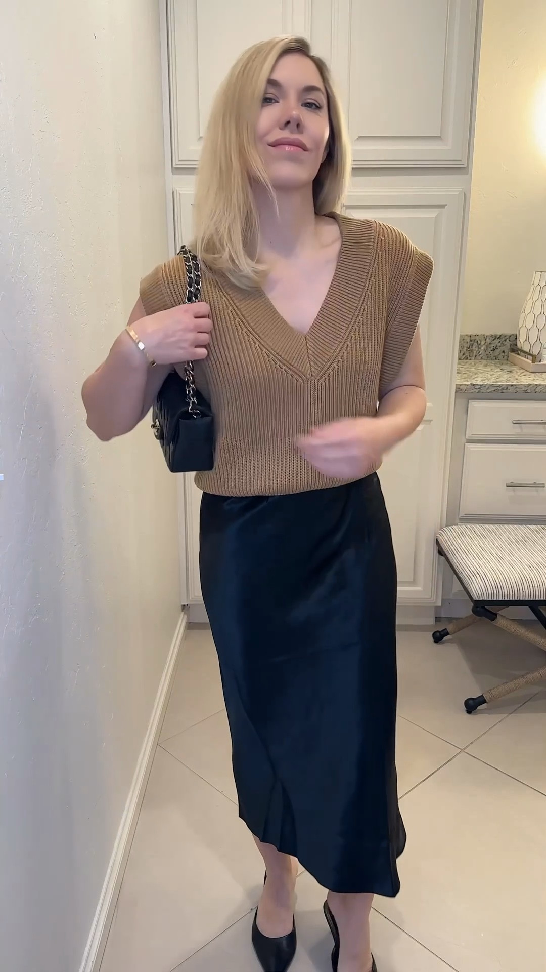 Styling a sweater vest (runs oversized, wearing the XS)

Blank skirt
Black pants
Tan sweater vest
#ltkstyletip

#LTKShoeCrush #LTKVideo #LTKFindsUnder100