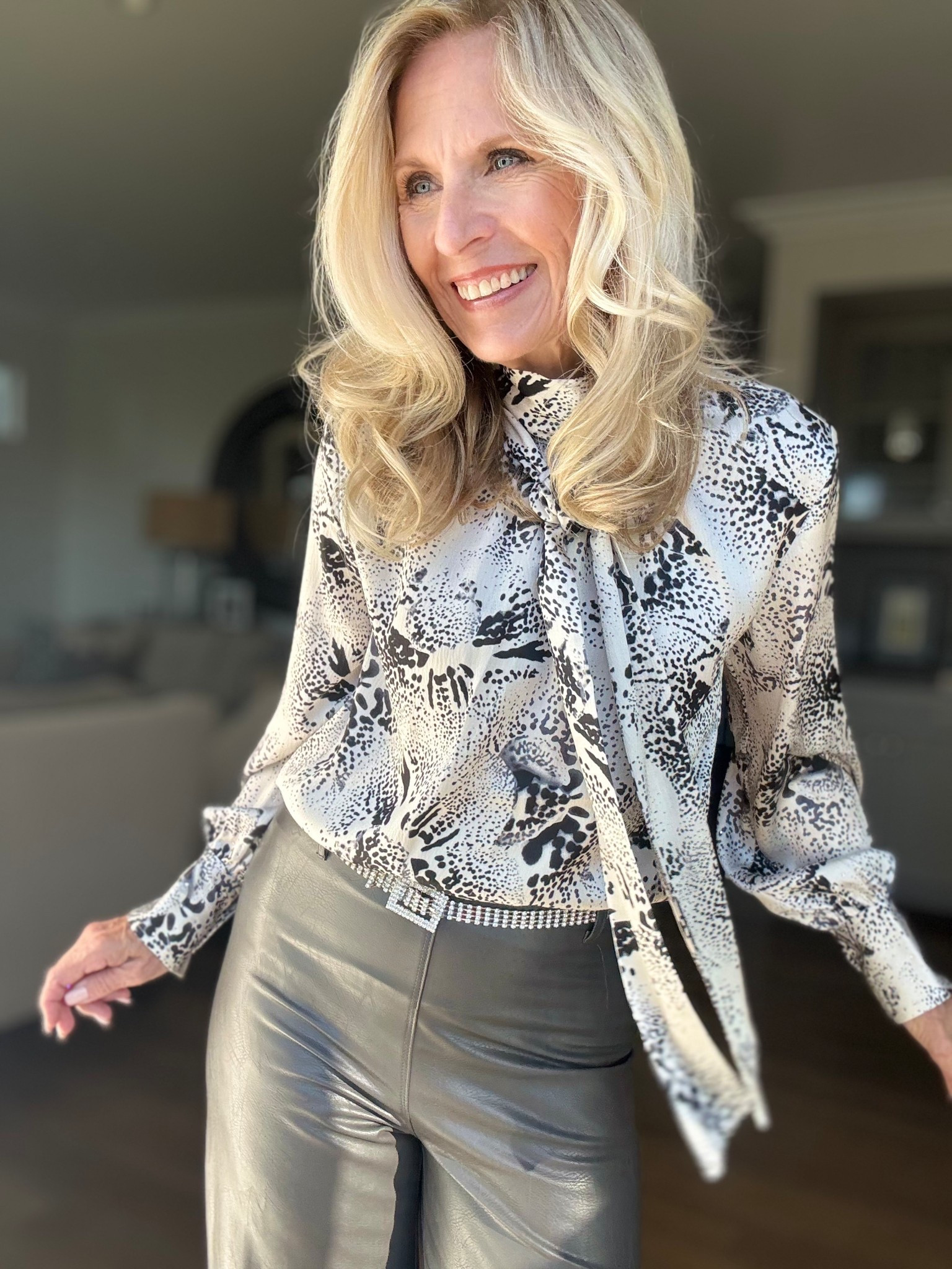 It’s so easy to fall in love with this outfit.

Are you looking for something to wear for Thanksgiving? This outfit is it. This beautiful pattern blouse has little rhinestones above the cuffs and a beautiful tie that you can knot or tie in a bow. So festive!

And can we talk about these vegan leather pants. They have some stretch and they have an inside patented 360° smoothing waistband. Yes, you heard me right and who doesn’t need that for Thanksgiving!

Follow me for more 50+ holiday style inspiration.

#LTKStyleTip #LTKHoliday #LTKOver40