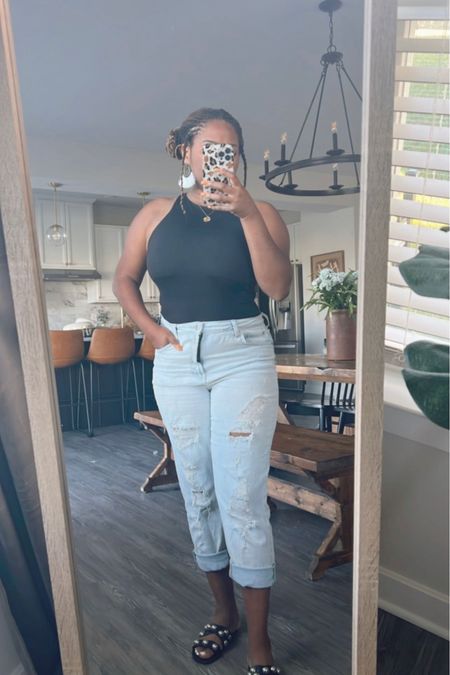 Outfit to run errands in. Comfortable high waisted mom jeans from Target, size 10, that you can roll up into capris. Paired the jeans with a black bodysuit from Amazon, size Large. These sandals are also from Target. I wear them with everything, size 7 1/2.

#LTKcurves