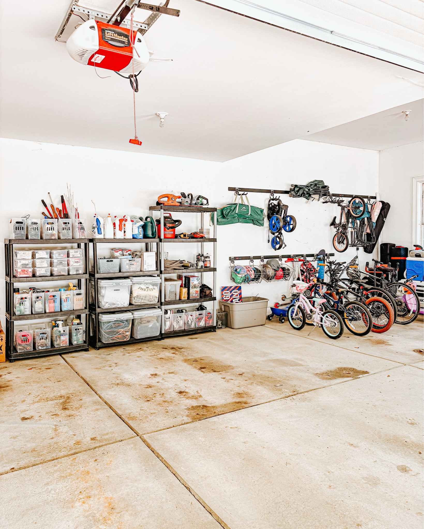Proof that the right systems hold up over time 🏀🛴. 

Four years later, the systems we put in place were still working well! The categories were still there, things were generally where they belonged and the space was still working for this family. A quick refresh later, this space is clean, tidy and ready for another summer! 

#organizedbyjm #organization #garageorganization #garagegoals #thecontainerstore