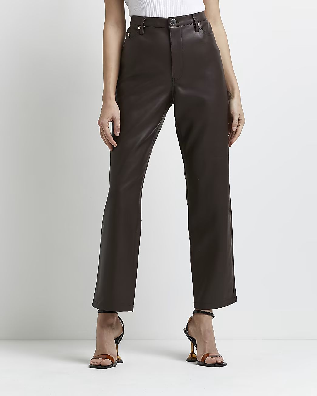 Petite brown faux leather straight trousers | River Island (UK & IE)
