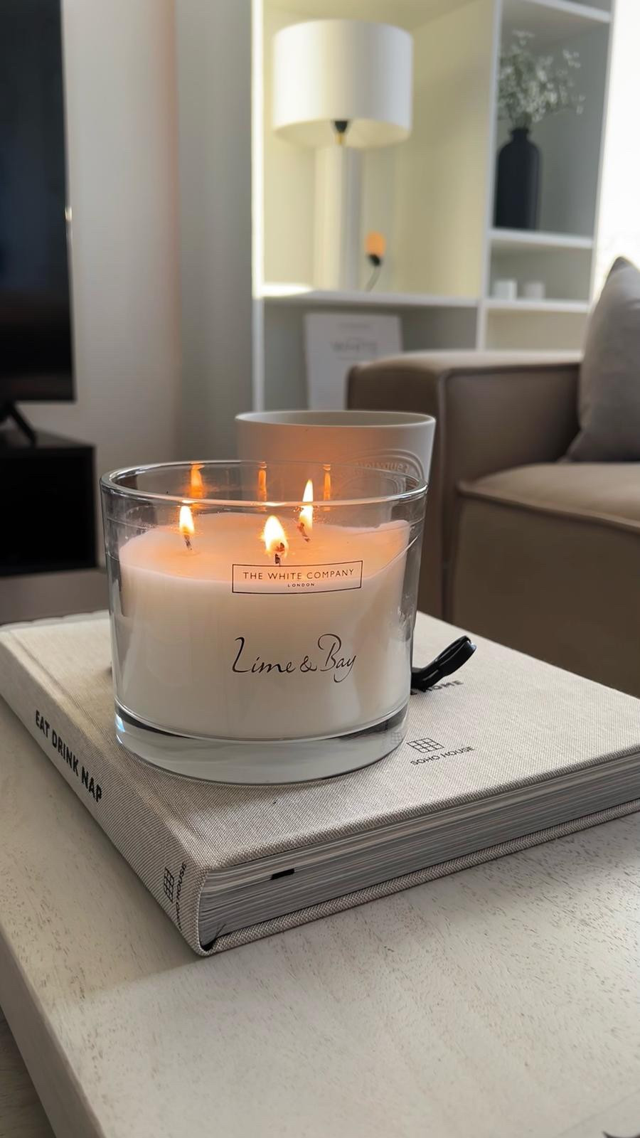 My favourite candle 🤍

The White Company, Soho Home, coffee table, book, 3 wick candle, living room, interior design, home decor, large candle, eat drink nap
