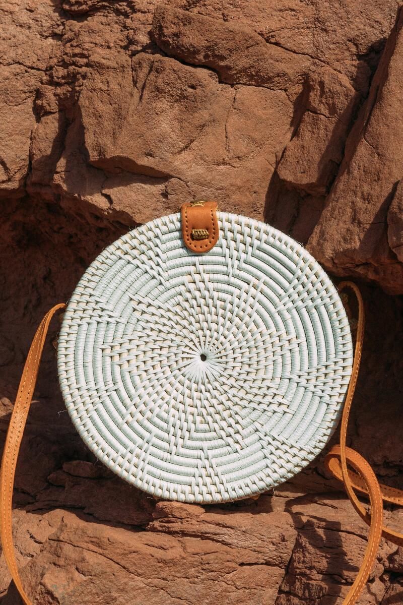 Aguna Round Rattan Crossbody in White | Francesca’s Collections