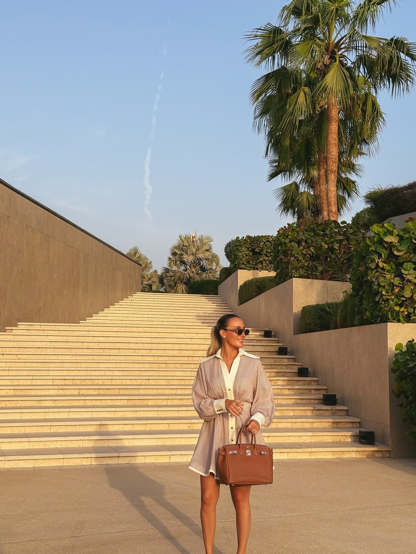 Zimmermann striped shirtdress, Hermès Birkin 30, Oran sandals, Amazon sunnies (Celine lookalike)

#LTKStyleTip #LTKTravel