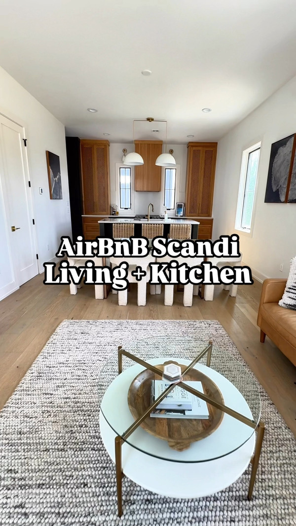 I’m loving how this tiny Scandinavian Airbnb merges the living room & dining room…