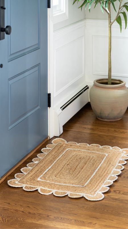 Pretty scalloped woven doormat and artificial olive tree. Coastal style home decor.

#LTKhome #LTKfamily