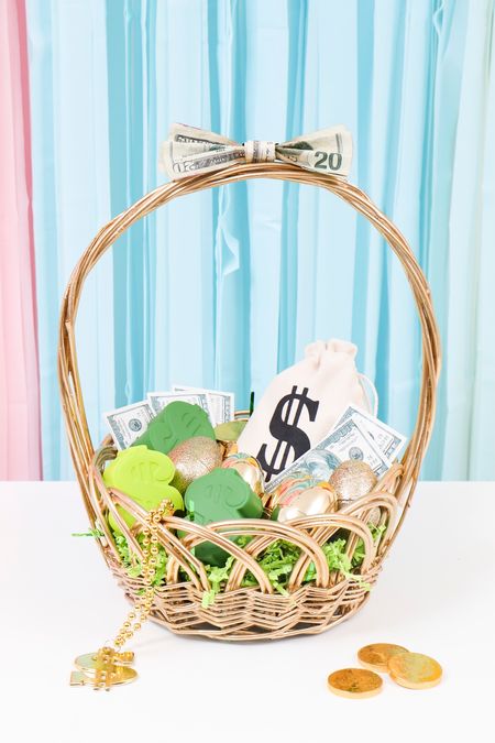 Teen Cash themed Easter Basket Idea
 
Teen approved Easter basket idea (great for graduation too!)! They are guaranteed to love this DIY cash themed Easter basket! Money themed treats & chocolate too! 💵🍫

🧺 Spray paint basket gold
💰Add a bag of cash!
🥚Fill gold eggs with cash
💲Add Dollar stress toys
💵 Add money notepads
💲Can’t forget the money gold chain
🥇Sprinkle with gold chocolate coins
💵 Finish by making a gift bow out of money!
 
#teeneasterbasket #teeneasterbaskets #easterbasketideas #moneythemed #cashgiftideas #easterbasketstuffers #easterbasketgoodies

#LTKkids #LTKSeasonal #LTKfamily