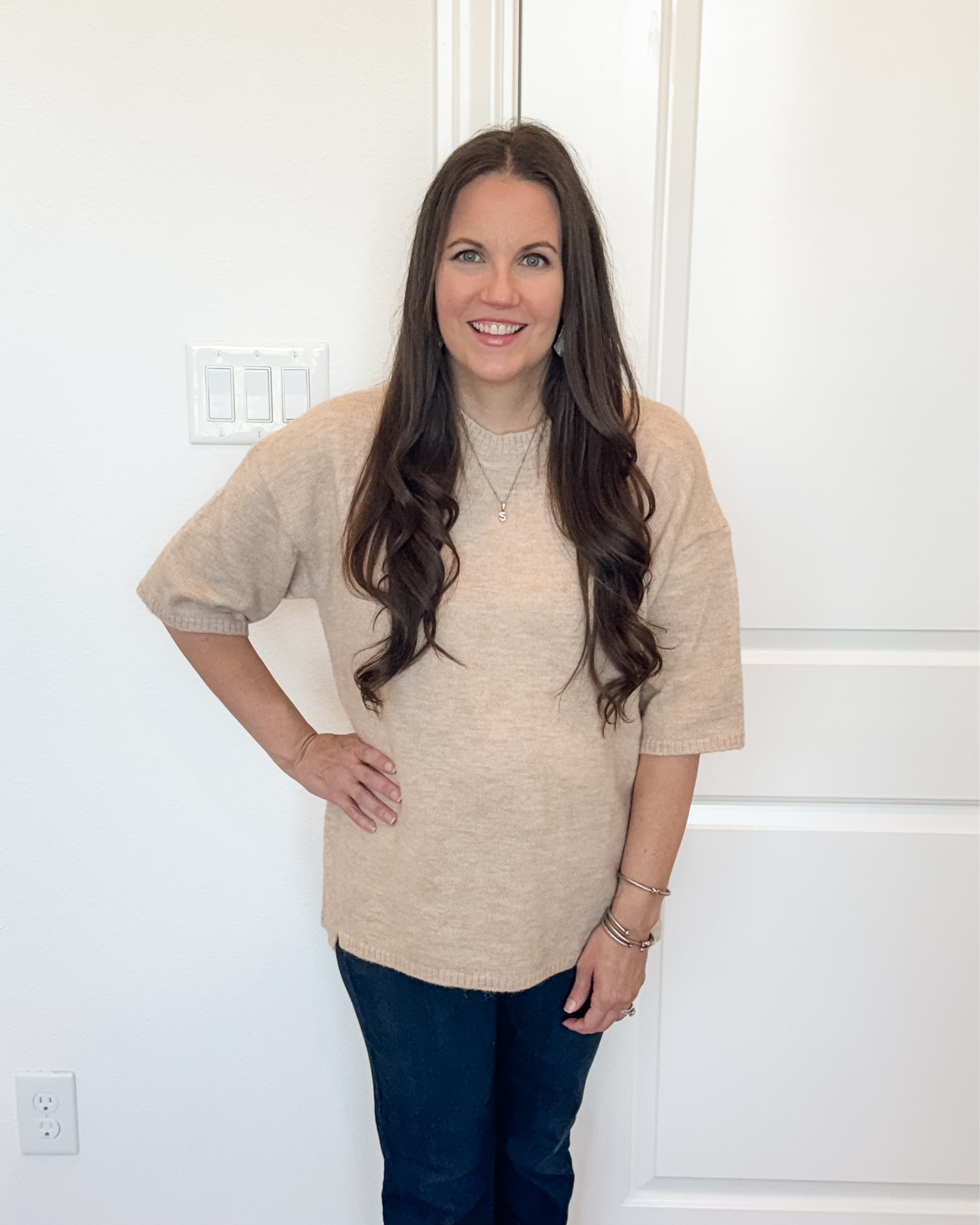 Neutral lovers, this one’s for you! This fall outfit is simple but looks so put together—light tan brown short sleeve sweater + beige knit top + dark blue bootcut jeans = the perfect fall street style formula. Added brown heels and an initial necklace to dress it up just a bit.
Such a cute option for casual fall outfits and warm fall days! 🍁

#LTKWorkwear #LTKootd #LTKSeasonal
