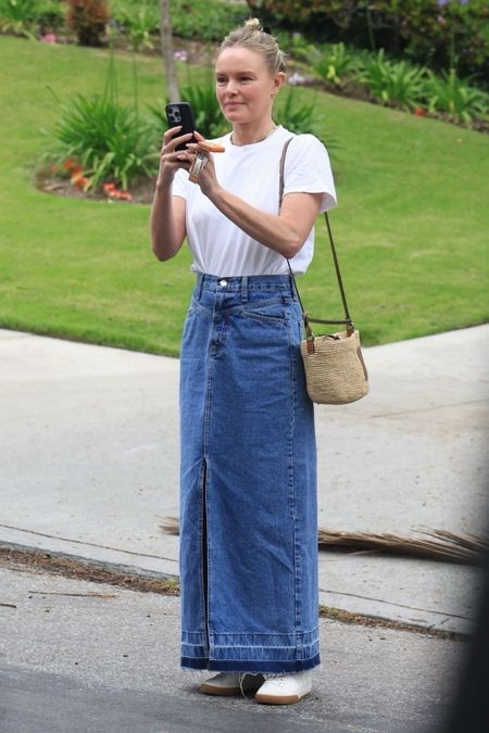 Shop Kate Bosworth's long denim skirts, basket bucket bag, white short sleeve tea, sneakers #KateBosworth #CelebrityStyle 

#LTKstyletip