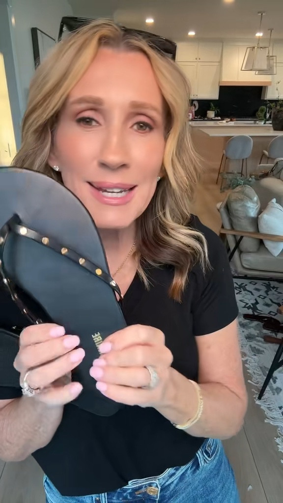 Chic black flip flop sandals.  Run true to size 

#LTKOver40 #LTKSeasonal