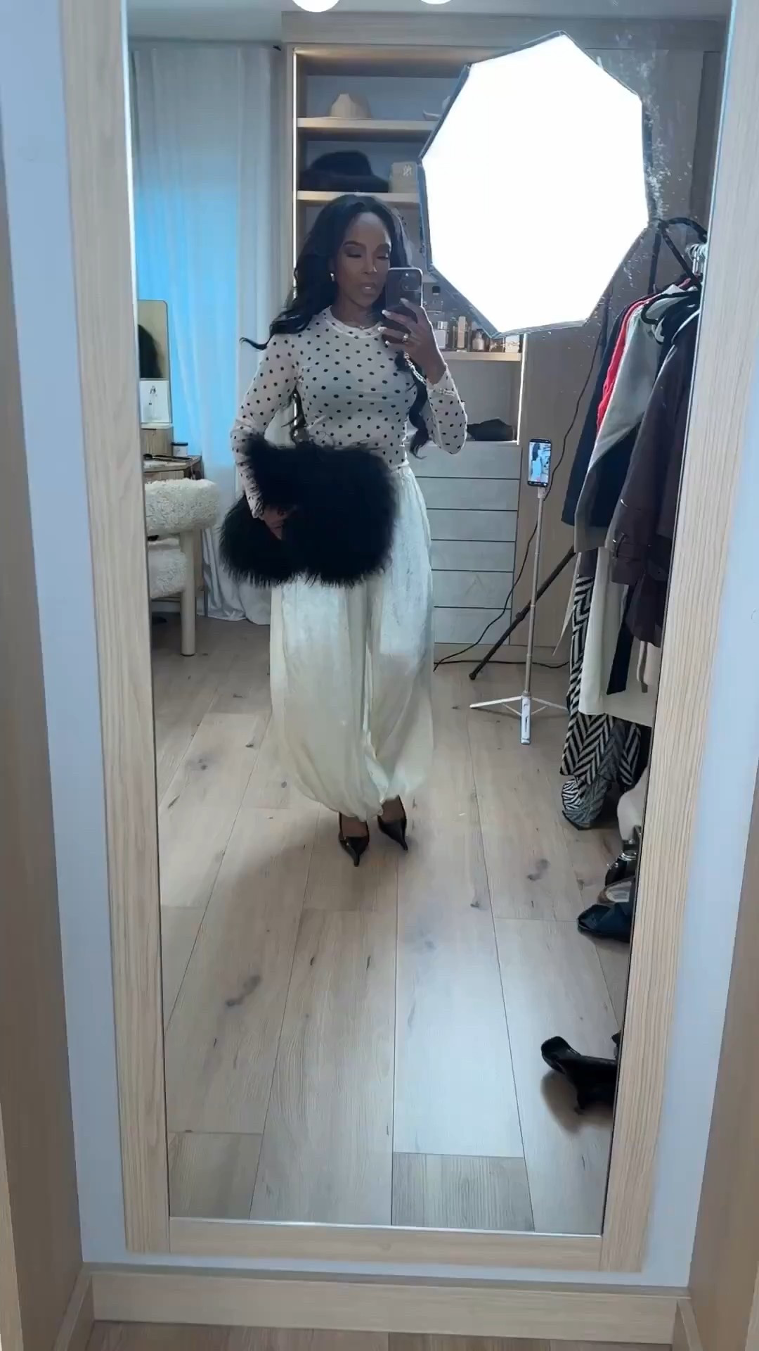 ✨ Romantic with a Playful Twist

This Valentine’s-ready look blends soft elegance with just the right amount of drama. The sheer polka-dot top adds a flirty, feminine feel, while the flowy satin pants keep everything elevated and chic. Finished with sleek heels and a statement feather clutch for that extra wow factor — effortless but memorable.

Styled with versatility in mind, each piece can be mixed back into your wardrobe multiple ways, making this a true cost-per-wear win built around timeless neutrals and standout details.

Perfect for:
• Valentine’s Day dinner
• Girls’ night out
• Rooftop cocktails
• Date night
• Dressed-up evening events

📏 Sizing:
Wearing size Small in top and pants
Heels true to size

📏 Measurements:
5’4” · 138 lbs
34D bust · 27” waist · 40” hips

Chic Valentine’s outfits, sheer polka dot top, satin wide-leg pants, elevated date night look, feminine evening outfit, warm-weather Valentine’s style, modern romantic fashion.

Follow me on Instagram and YouTube @kirasfashionfinds



#LTKgrwm #LTKvlog #LTKValentine