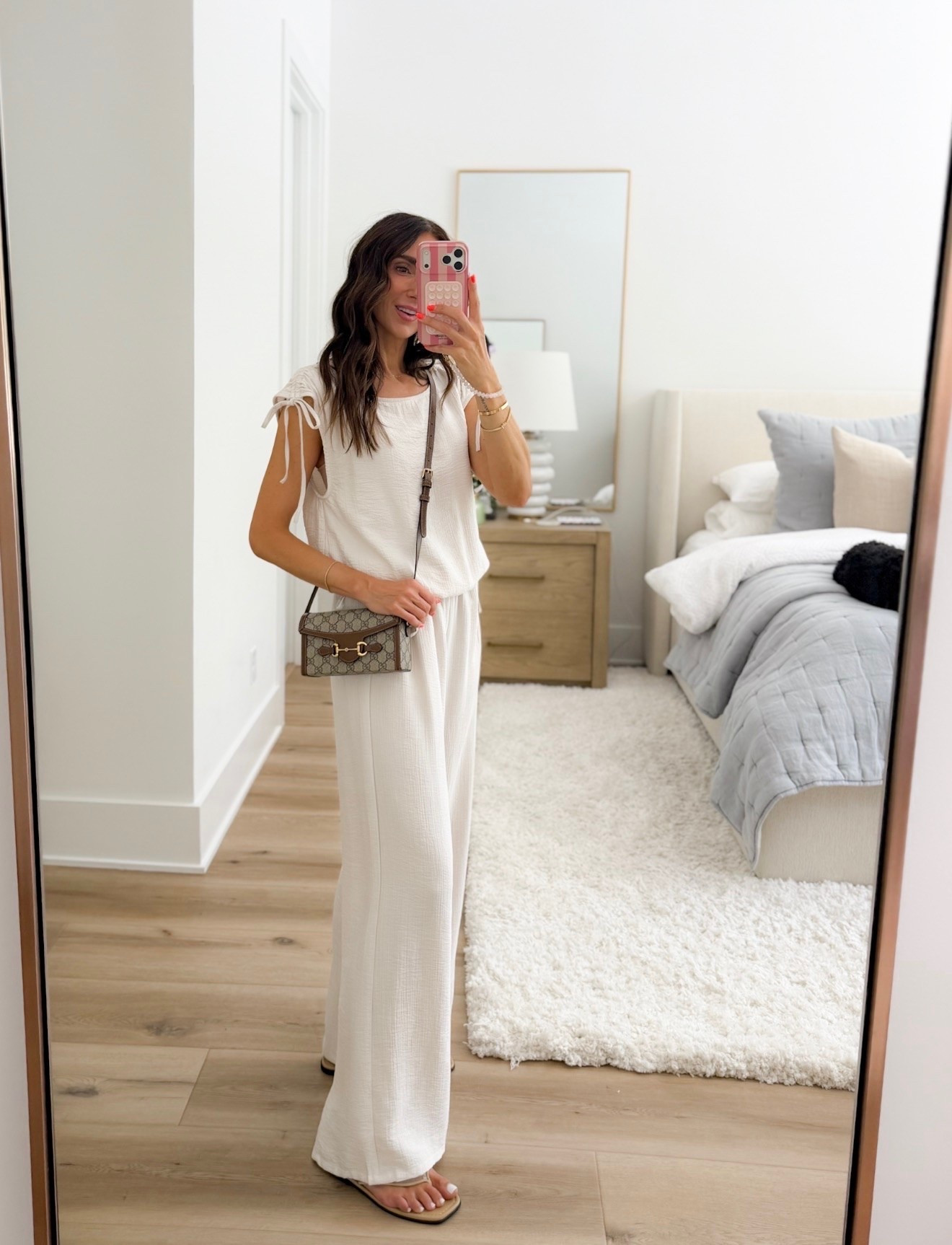 This matching set is one of those outfits that makes getting dressed so easy. The lightweight fabric, wide leg pants, and tie shoulder details make it perfect for warm days, travel, or dinner out.

matching set, two piece set, wide leg pants, tie shoulder top, neutral outfit, summer outfit, travel outfit, vacation style, casual chic outfit, women’s matching set, annabrstyle

#LTKSeasonal #LTKPetite #LTKOver40