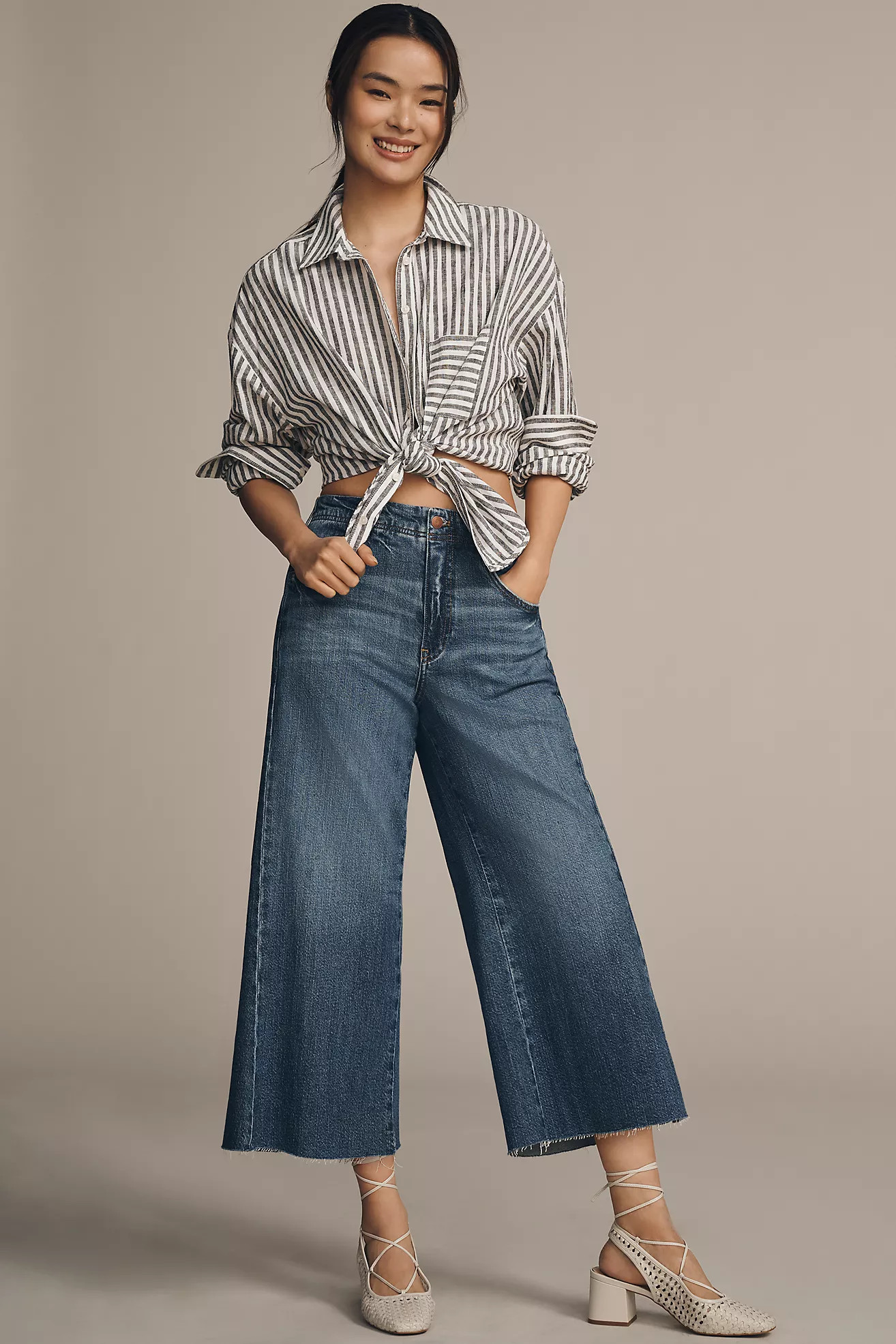The Adi Mid-Rise Frayed Relaxed Flare Jeans by Pilcro: Cropped Edition | Anthropologie (US)