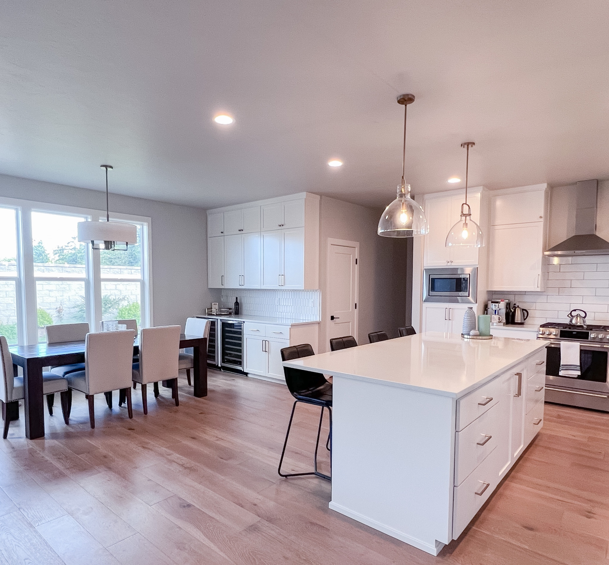 The dining room and kitchen pulls together with these counter stools from West Elm! They are so comfy and super neutral. Also sharing these pendant lights for the kitchen.

#LTKfamily #LTKstyletip #LTKhome