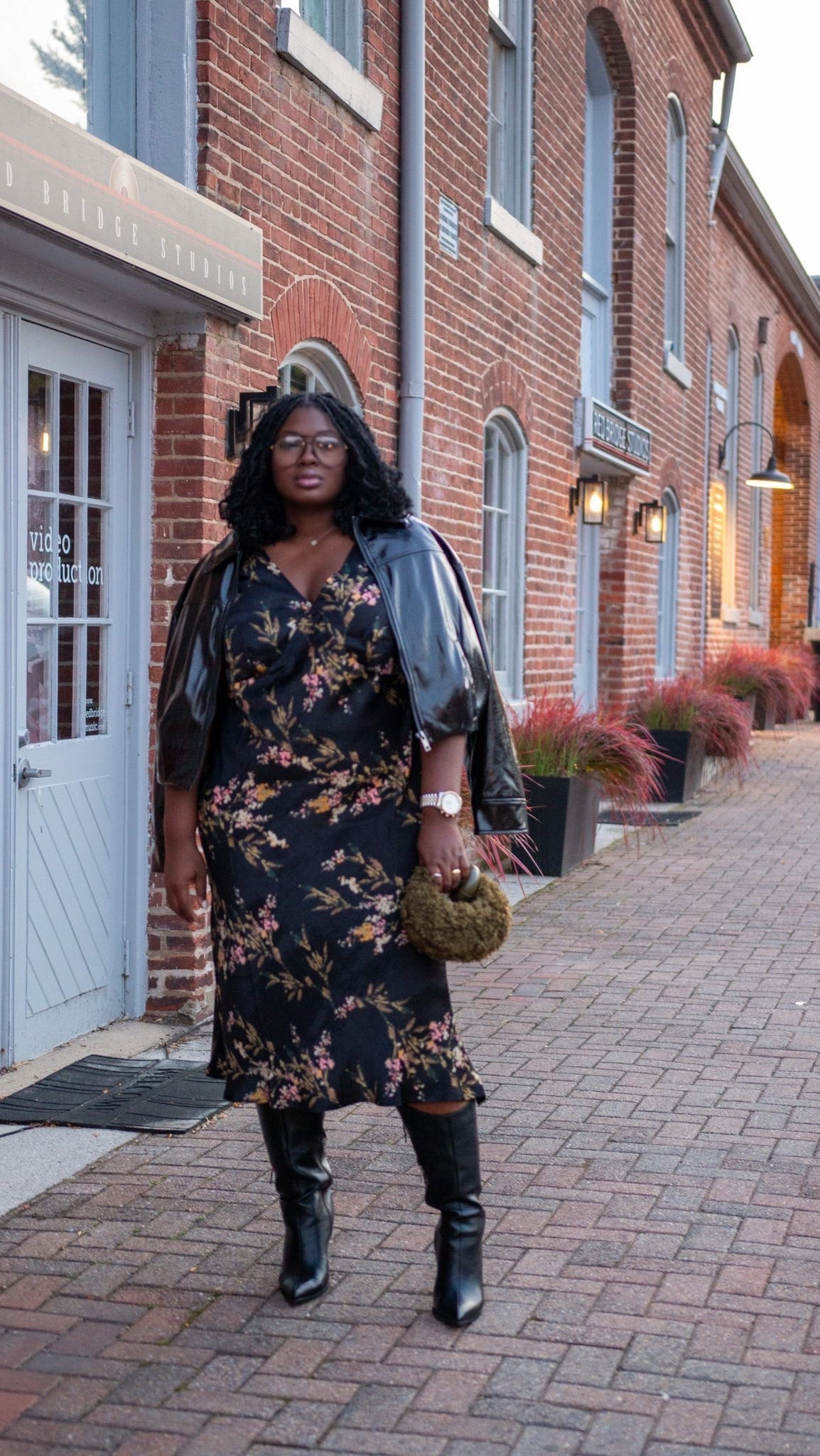 Getting ready for date night is easier with a dress that already does most of the work. A floral midi dress brings color and movement, while black knee-high boots and a leather jacket make the look feel more elevated. plus size fall outfits, floral midi dress outfit, how to style a floral dress, black leather jacket outfit, knee high boots outfit, curvy girl fall fashion, fall date night outfit, women's fall fashion, chic fall outfit ideas, fall fashion inspiration. @amazonfindsandfashion @abercrombie
