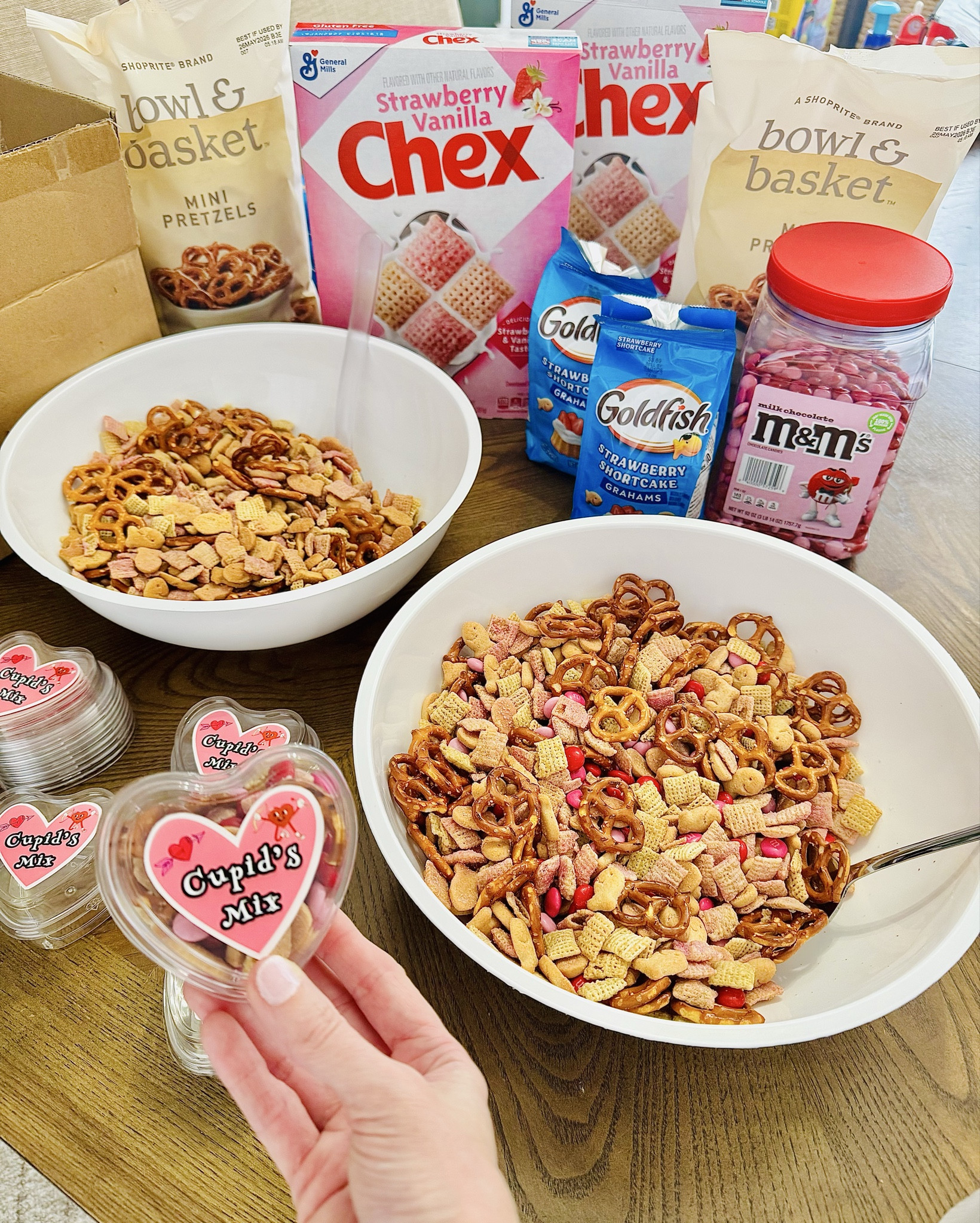 Made a little “Cupid Mix” for the kids’ classroom Valentine’s parties 💘
So simple, so cute, and honestly the containers make it look way more extra than it actually is 😂

I used my Liene sticker maker to make the little tags (obsessed) and now they’re all packed up and ready to go! 💌🍓🥨🍫

Perfect sweet + salty mix and the kids are going to LOVE them.

#LTKValentine #LTKfoodie #LTKKids
