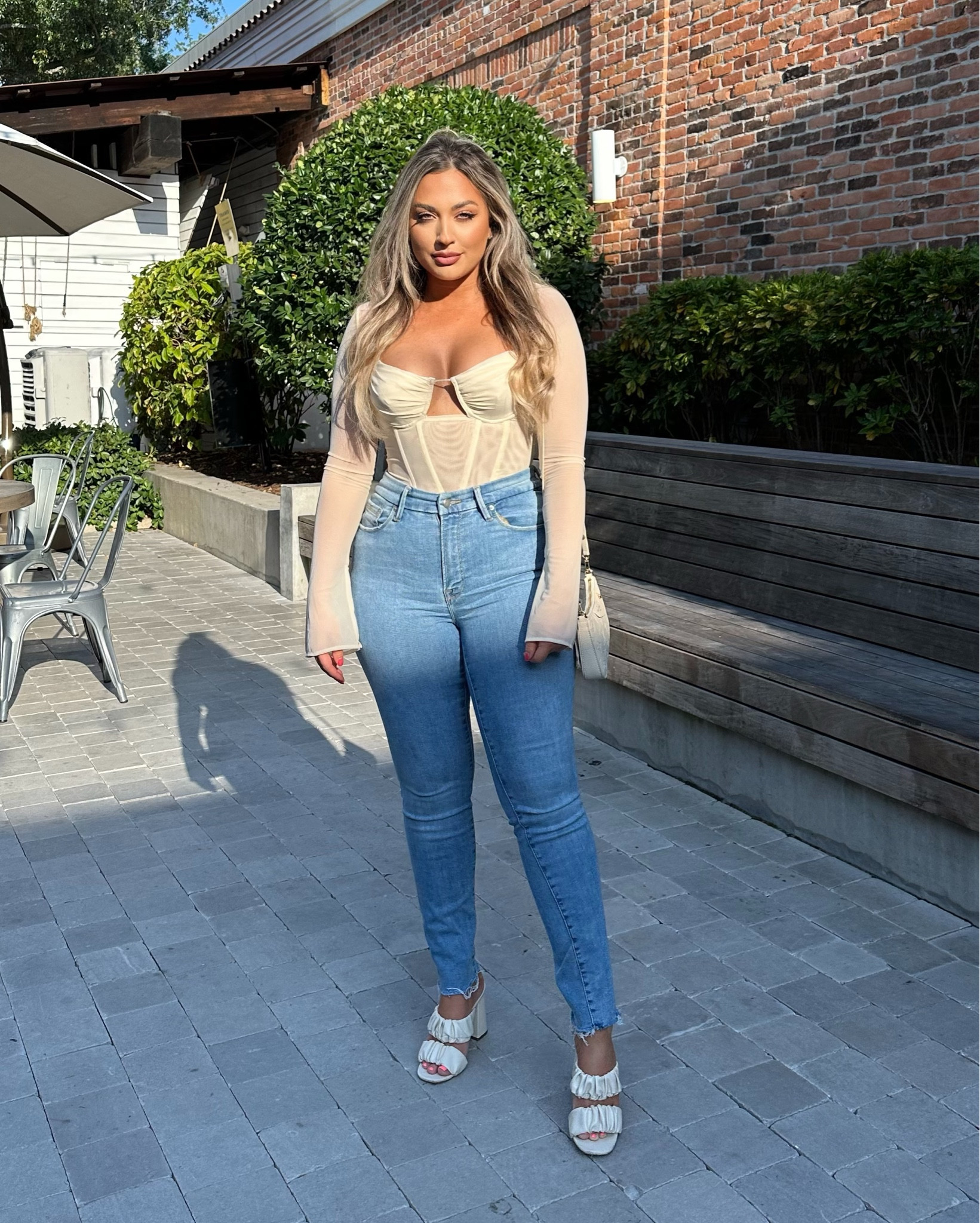 Curvy girls night out outfit. Wearing a medium in the top (I cut the middle strings as seen in the picture & I liked this top sooo much better). Wearing a size 10 in the jeans (they fit perfectly, have stretch). I’m 5’3. 

#LTKStyleTip #LTKFindsUnder100 #LTKMidsize