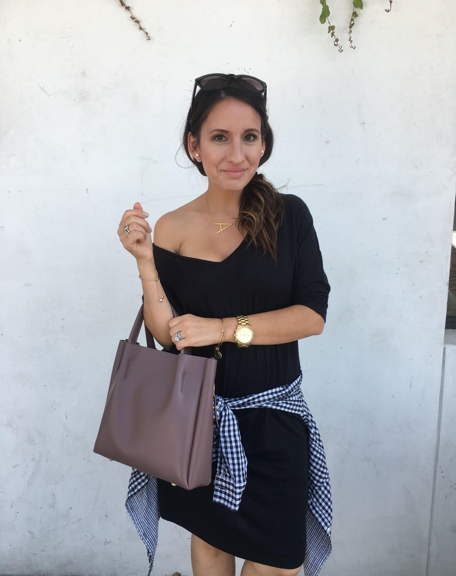 Black sheath dress, gingham shirt, taupe handbag, gold earrings, gold necklace, and old school Michael Kors watch. 
Petite style 
Petite outfit 
Lunch style 


#LTKFindsUnder50 #LTKPetite #LTKOver40