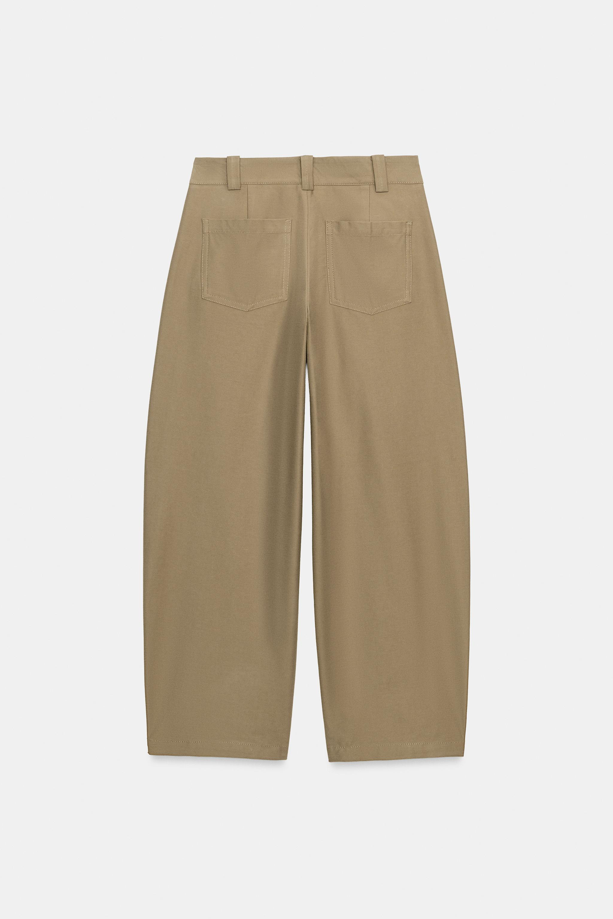 Mid-waist trousers featuring front pockets and rear patch pockets. Loose-fit leg that tapers towa... | Zara FR