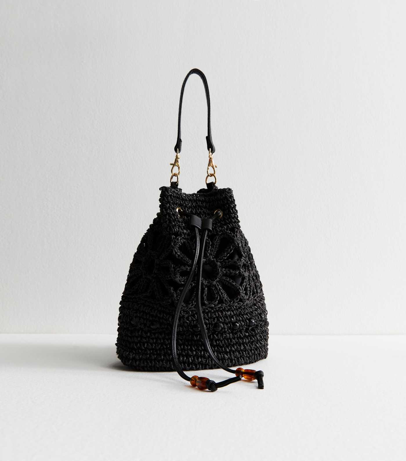 Black Floral Woven Raffia Look Drawstring Bucket Bag | New Look | New Look (UK)