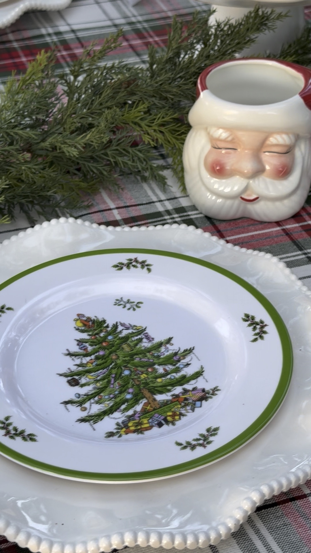 I love these traditional Spode Christmas tree plates, which are now available in durable melamine! They are dishwasher-safe, which is an added bonus! They look great paired with my tried and true Perlette ruffled melamine plates, plaid holiday tablecloth, Santa mug, and antler napkin rings (and white cloth napkin)! This minimalistic faux pine garland adds a modern touch to this classic Christmas Tablescape! Everything is from @wayfair, of great quality and at an amazing price point! ❤️🎄 #wayfair #wayfairpartner #onlyatwayfair #paidlinks

#LTKHoliday #LTKFindsUnder100 #LTKParties