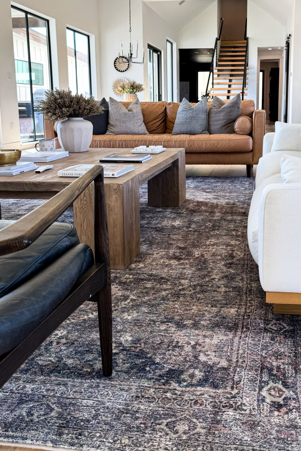 Our living room is all about mixing textures and tones for a cozy yet modern feel!