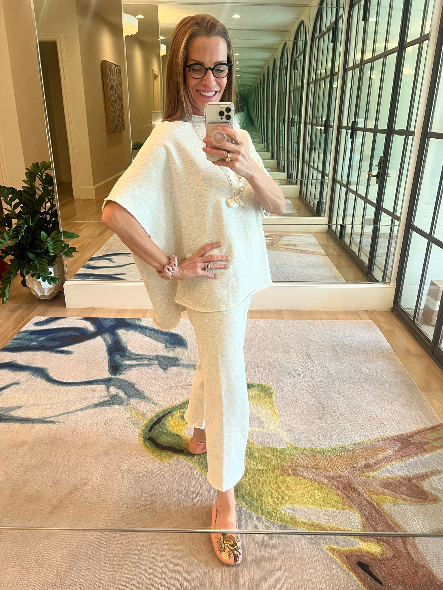 Love this travel outfit so much y’all! So comfy, so cozy! Size down as there’s plenty of room. Drawstring, cropped pants, and high-low top. Heather gray fleece is fabulous is perfect for fall transition. 

#LTKstyletip #LTKSeasonal #LTKtravel