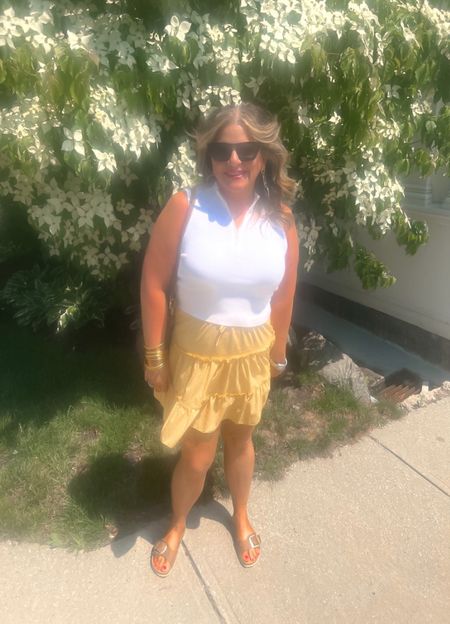 Amazon Fashion for the win!! 
This 1/2 zip sleeveless top gives me total 90’s vibes. (You guys KNOW how much I love that!) This skirt comes in about 50 different colors/prints. 
Amazon Fashion, Y2K fashion

#LTKSeasonal #LTKunder50 #LTKFind