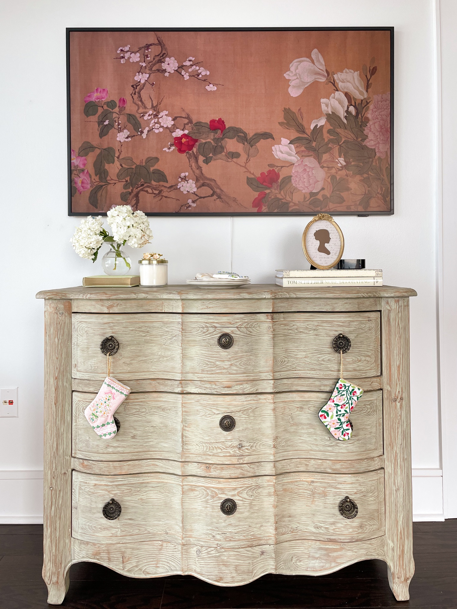 Our Frame TV is finally hung so I got to decorate this chest finally☺️  Added my cutesy lil Bauble Stockings for the Holidays🎄💕

#LTKHoliday