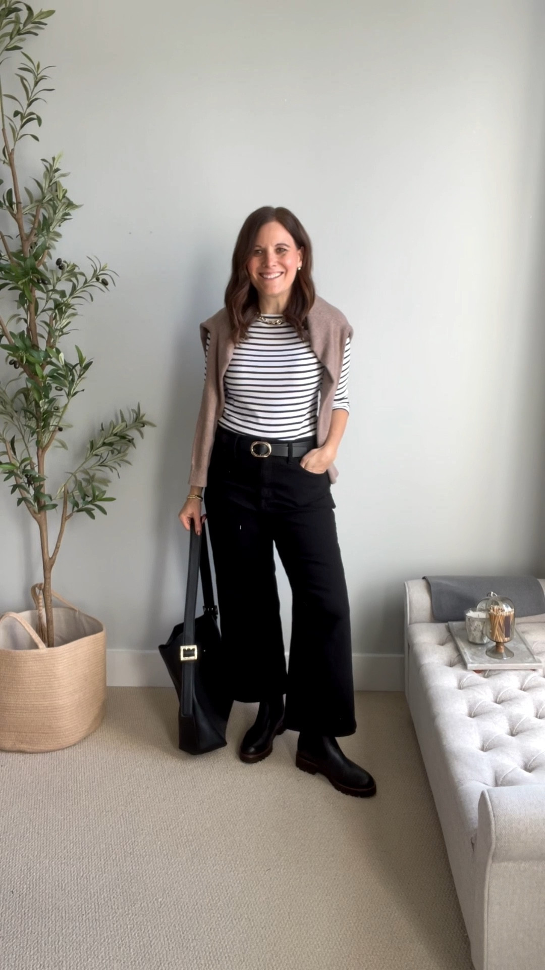 Pair your black pants with a striped shirt that includes black, then add a cardigan in a complementary color. This was my work uniform for many years when I worked in an office. I love pairing a Kelly green or fuchsia cardigan with black and white.
If you saw my ankle boots post, you know my thinking has changed since I took this photo. Wearing wide leg cropped jeans with lug sole Chelsea boots can make the hemline feel heavy and the leg line look chopped up. I’d love this look even more with a sleeker ankle boot. These wide leg cropped jeans fit true to size. #falloutfit 


#LTKMidsize #LTKOver40 #LTKStyleTip