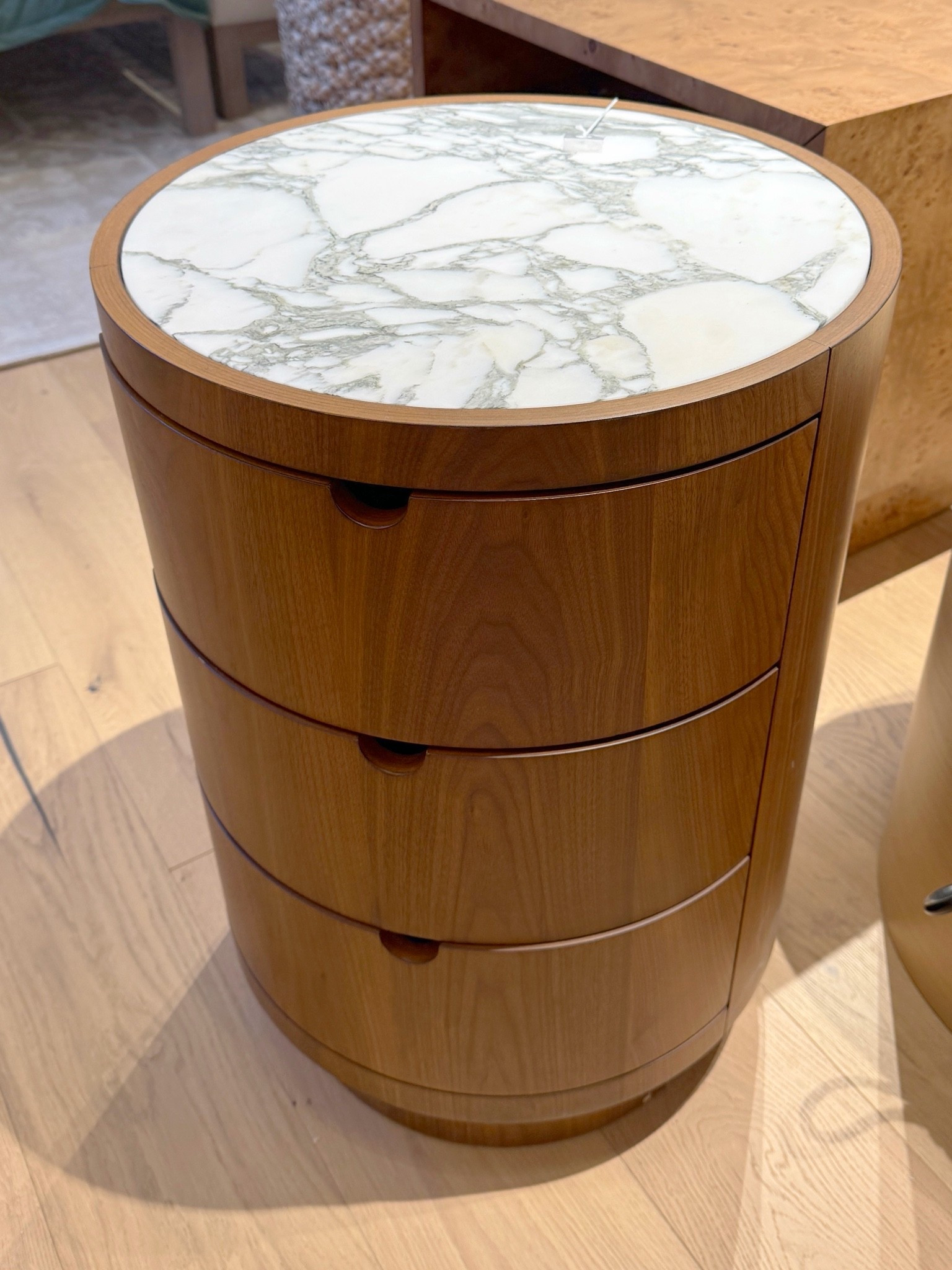 The Gracia Nightstand from Crate & Barrel is such a stunning statement piece with its rounded silhouette, warm walnut finish, and gorgeous marble top. 😍 The curved shape and hidden finger-pull drawers give it that perfect blend of modern organic and luxury design. 🤎 A beautiful bedside table that adds warmth, texture, and a high-end feel to a bedroom setup! ✨ #NightStand #CrateAndBarrel #BedsideTable

#LTKHome #LTKSaleAlert